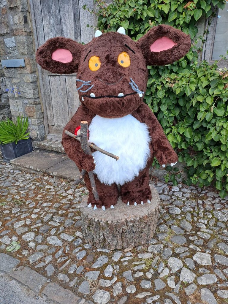 A gruffalo scarecrow